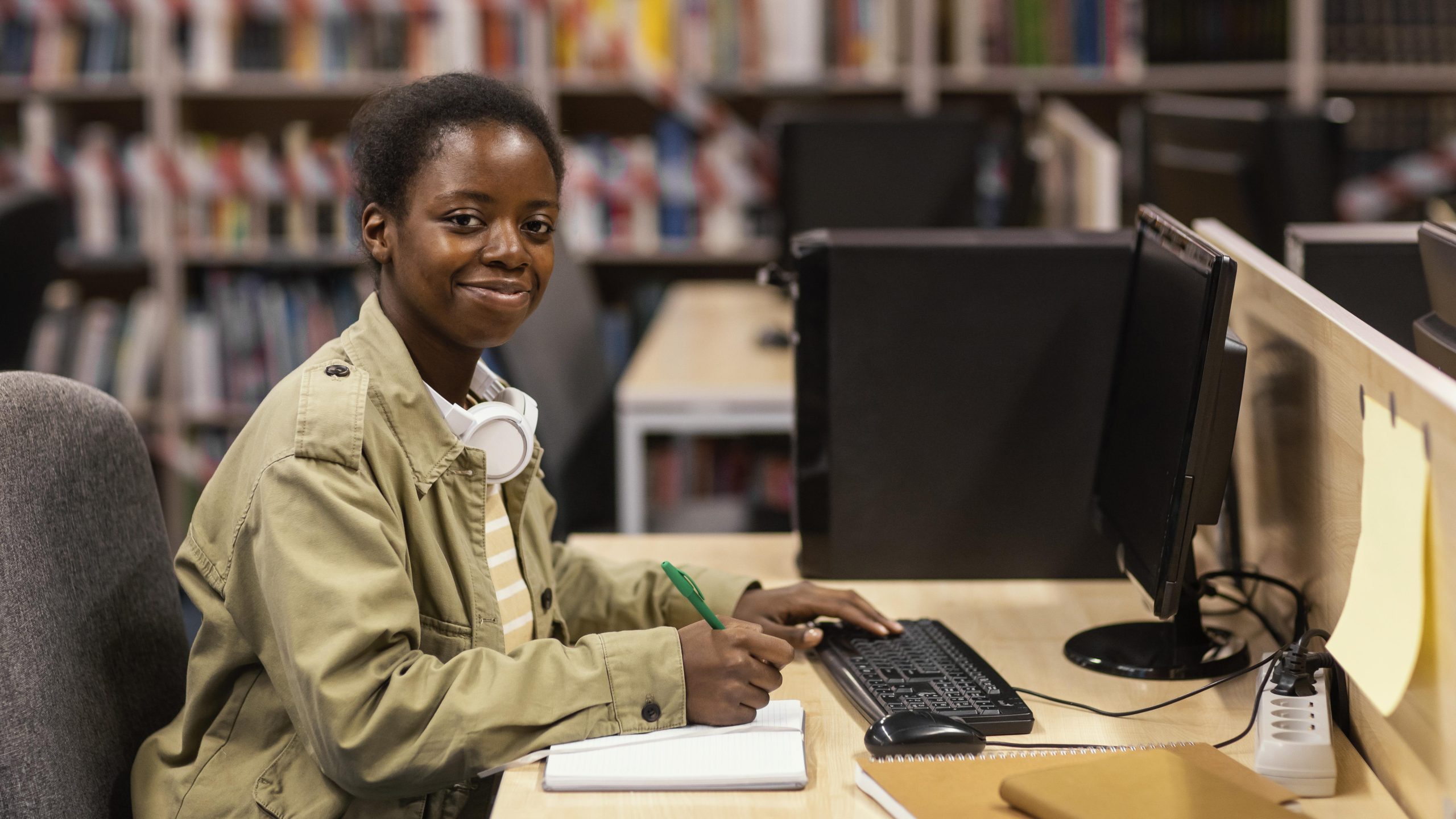 young-woman-studying-library